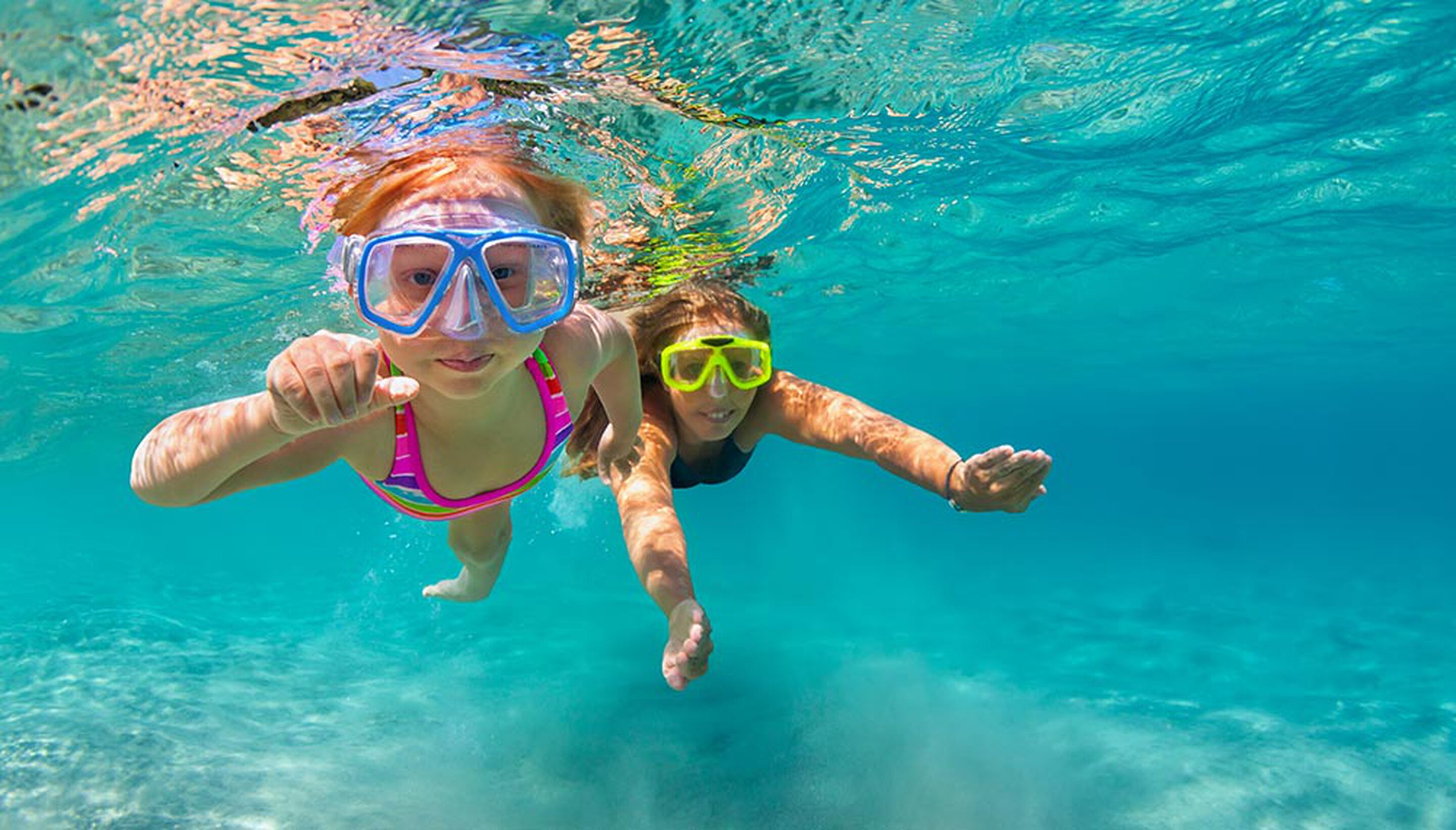 Luxury beach day for children &ndash; sun hats, swimsuits, and playful activities