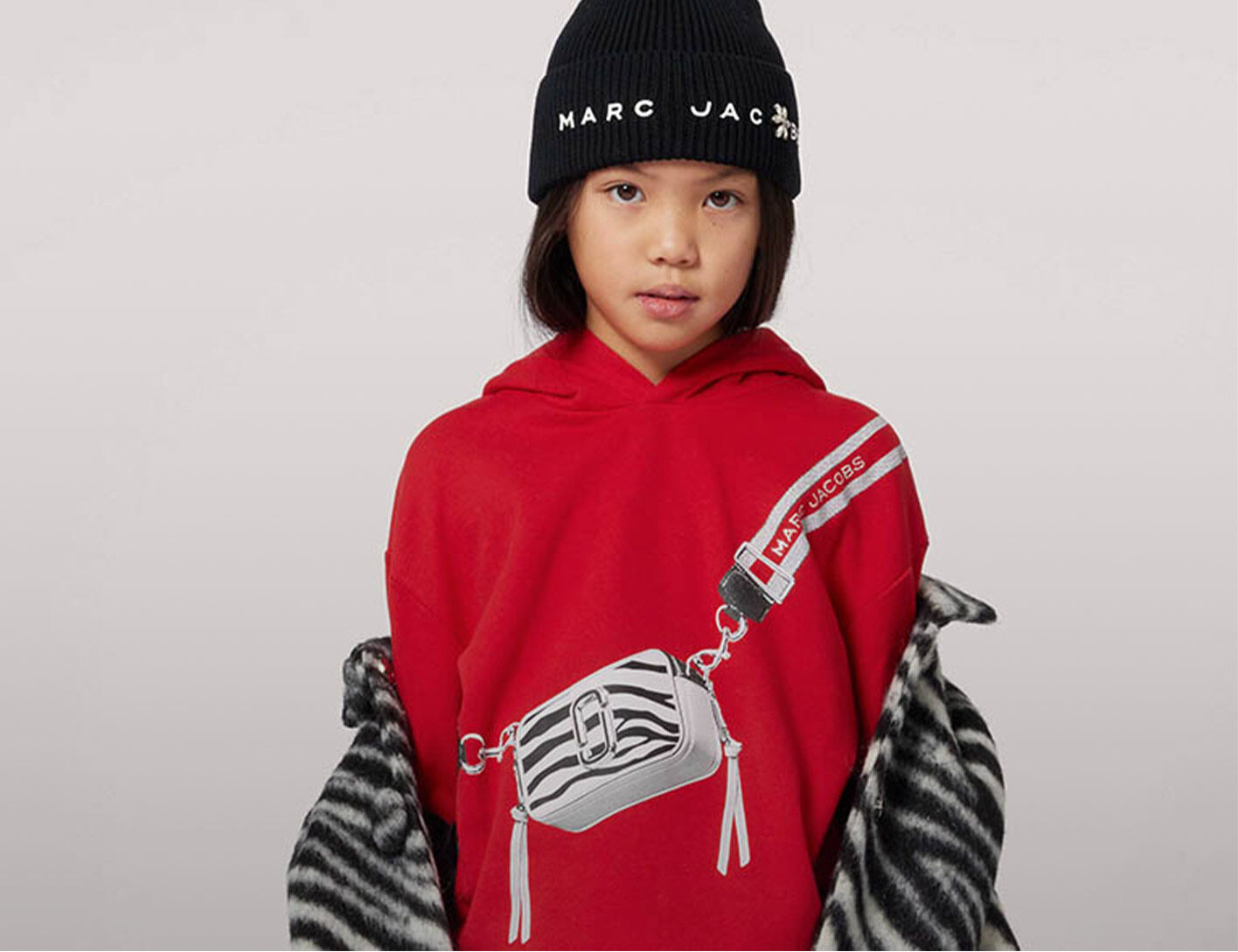 Premium- en luxe kinderkleding van topmerken, afgeprijsd bij Kids Around.