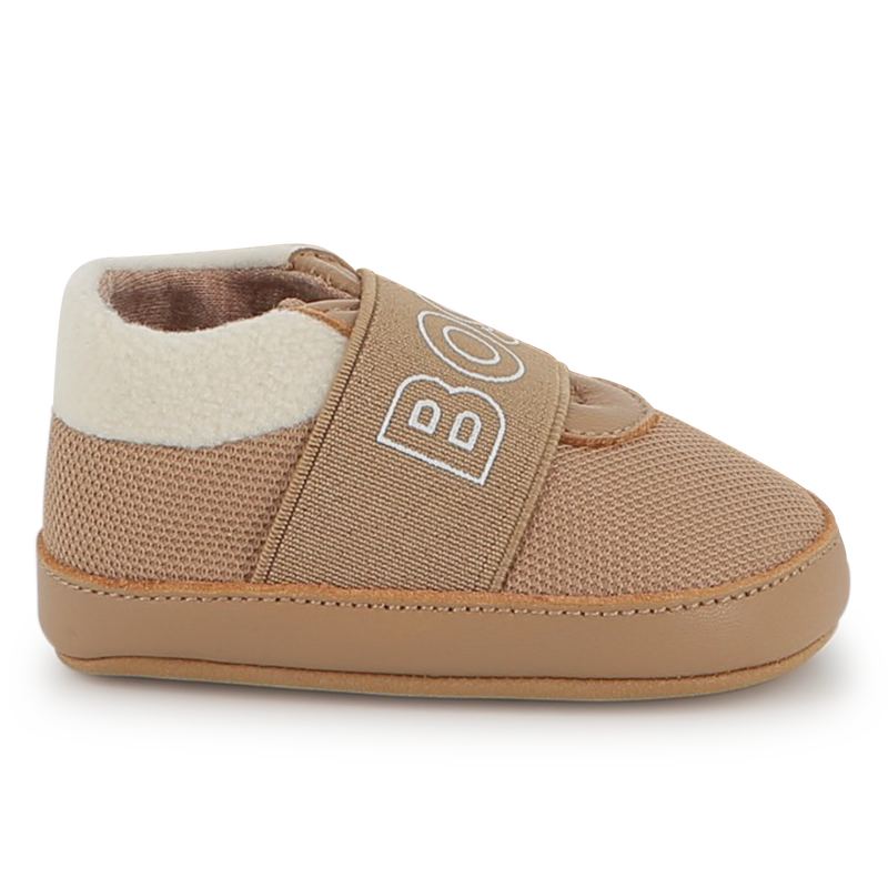 Chaussons souples en cuir de mouton BOSS 
                    UNISEXE