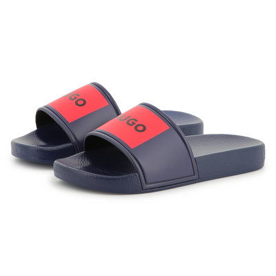 Claquettes à badges Hugo GARCON