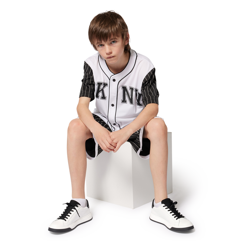 Chemise large &agrave; pressions DKNY 
                        UNISEXE