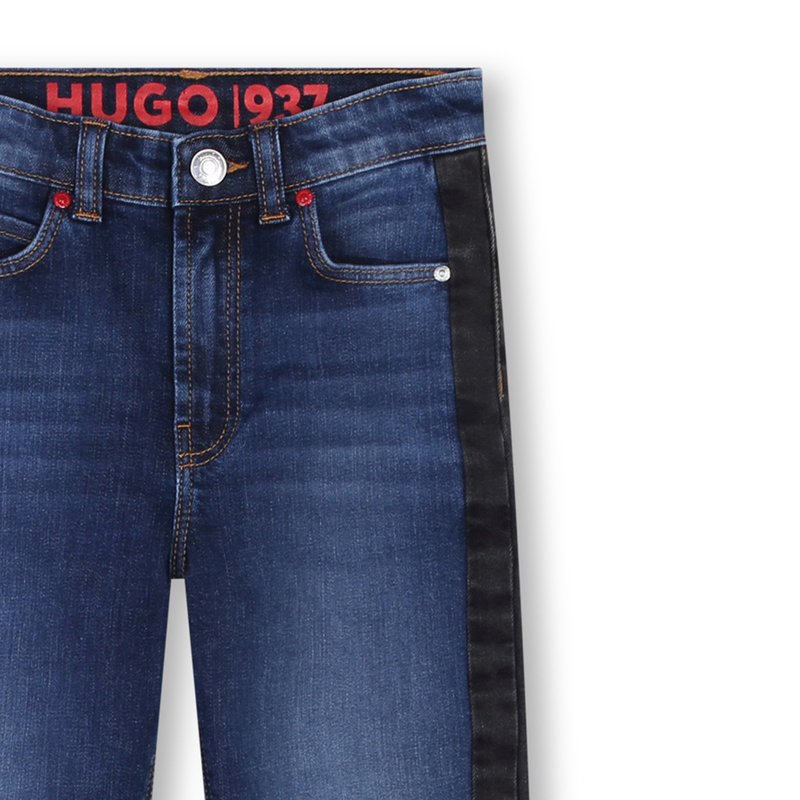 Jean avec empiècements côtés Hugo 
                    FILLE