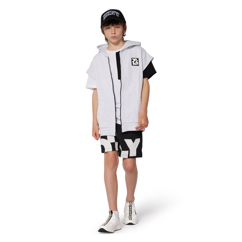 T-shirt large avec poche DKNY 
                        UNISEXE