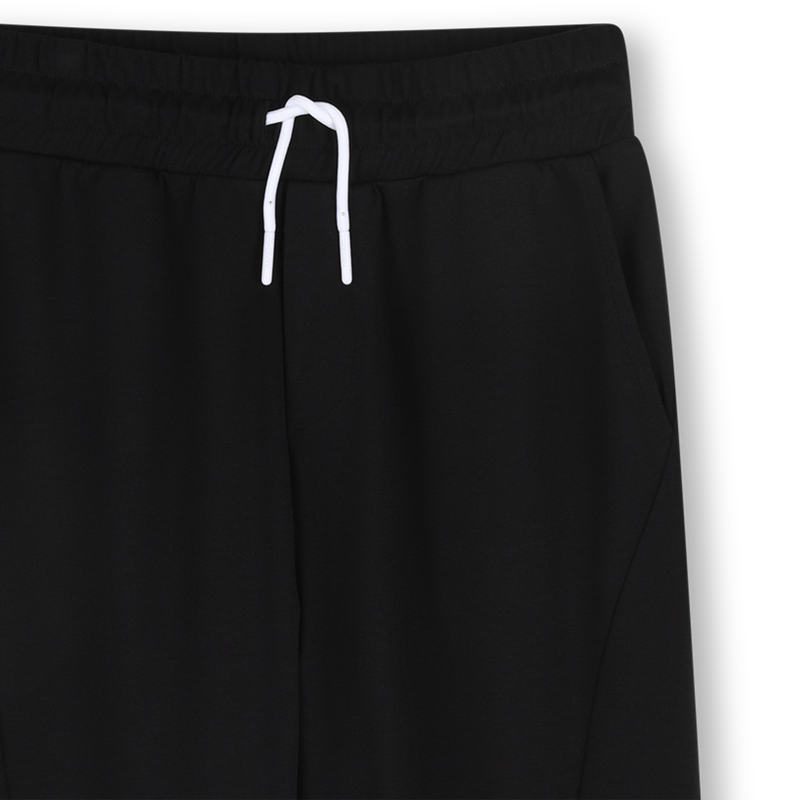 PANTALON AVEC POCHES DKNY 
                        UNISEXE