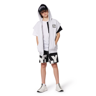 T-shirt large avec poche DKNY UNISEXE