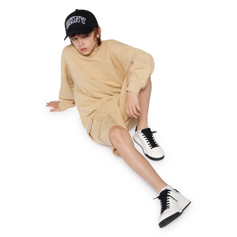 Baskets lac&eacute;es en cuir de vachette DKNY 
                    UNISEXE