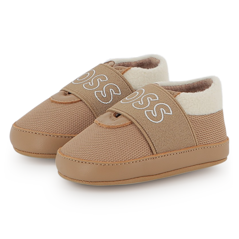 Chaussons souples en cuir de mouton BOSS 
                    UNISEXE