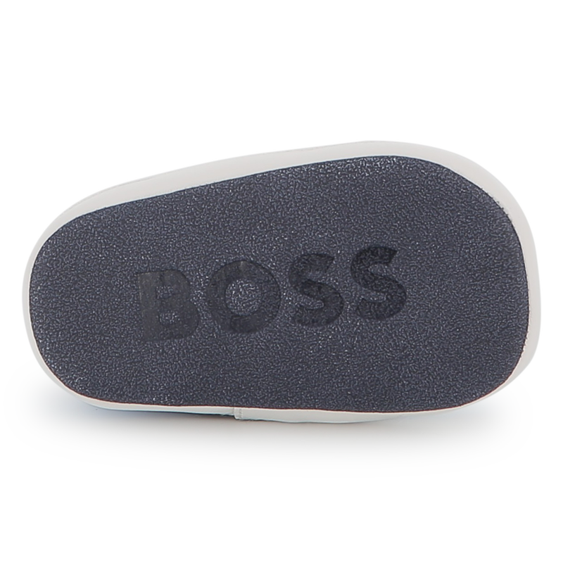 Chaussons souples en cuir de mouton BOSS 
                        UNISEXE