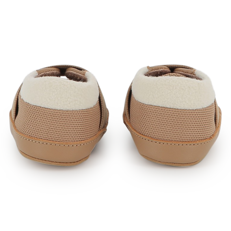 Chaussons souples en cuir de mouton BOSS 
                    UNISEXE