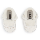 Chaussons souples en cuir de mouton BOSS 
                    UNISEXE