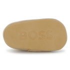 Chaussons souples en cuir de mouton BOSS 
                    UNISEXE