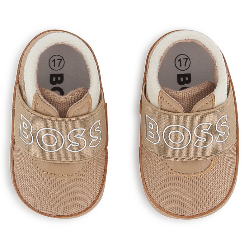 Chaussons souples en cuir de mouton BOSS 
                    UNISEXE